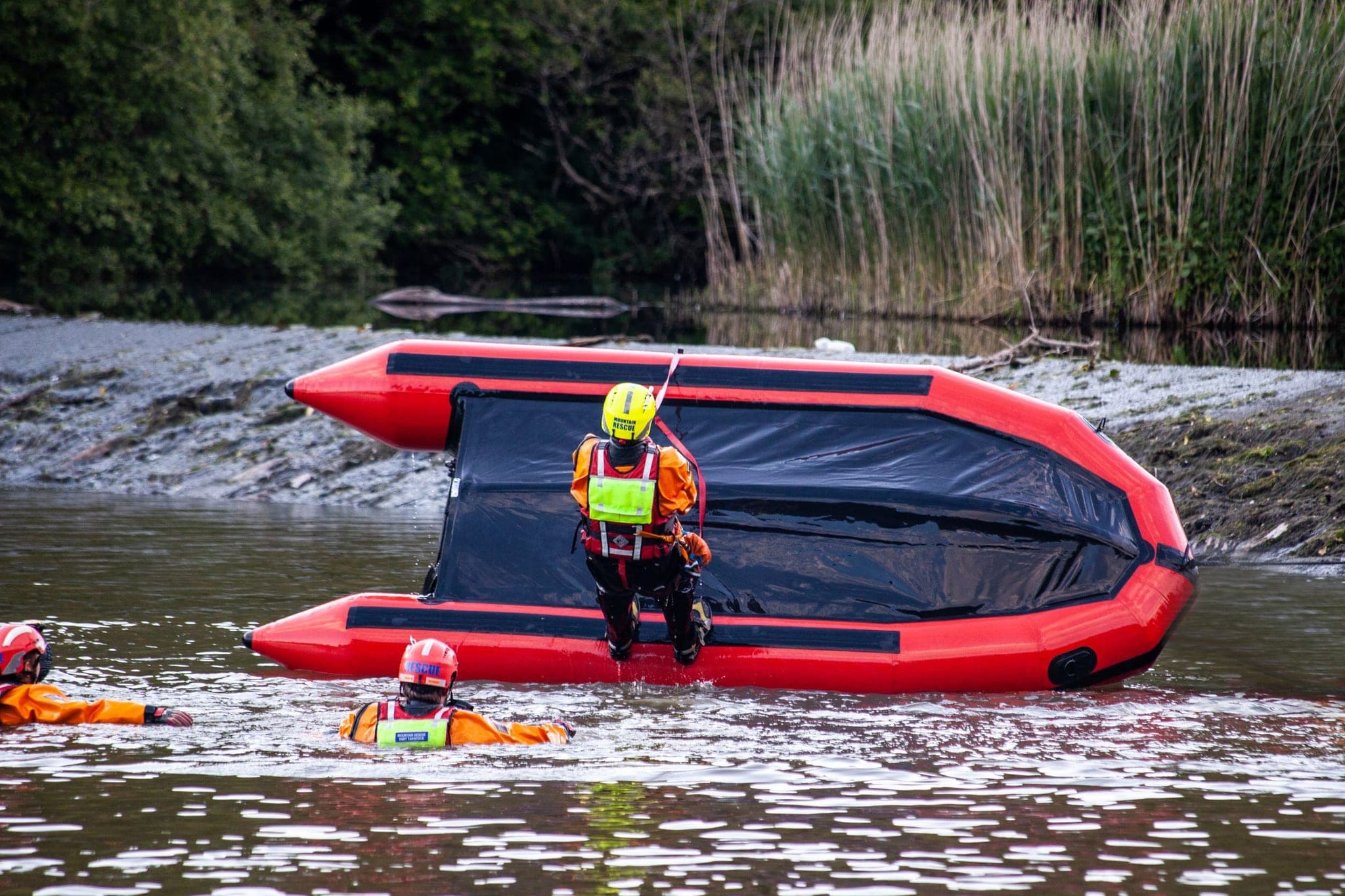Capsize drills being practiced on the water