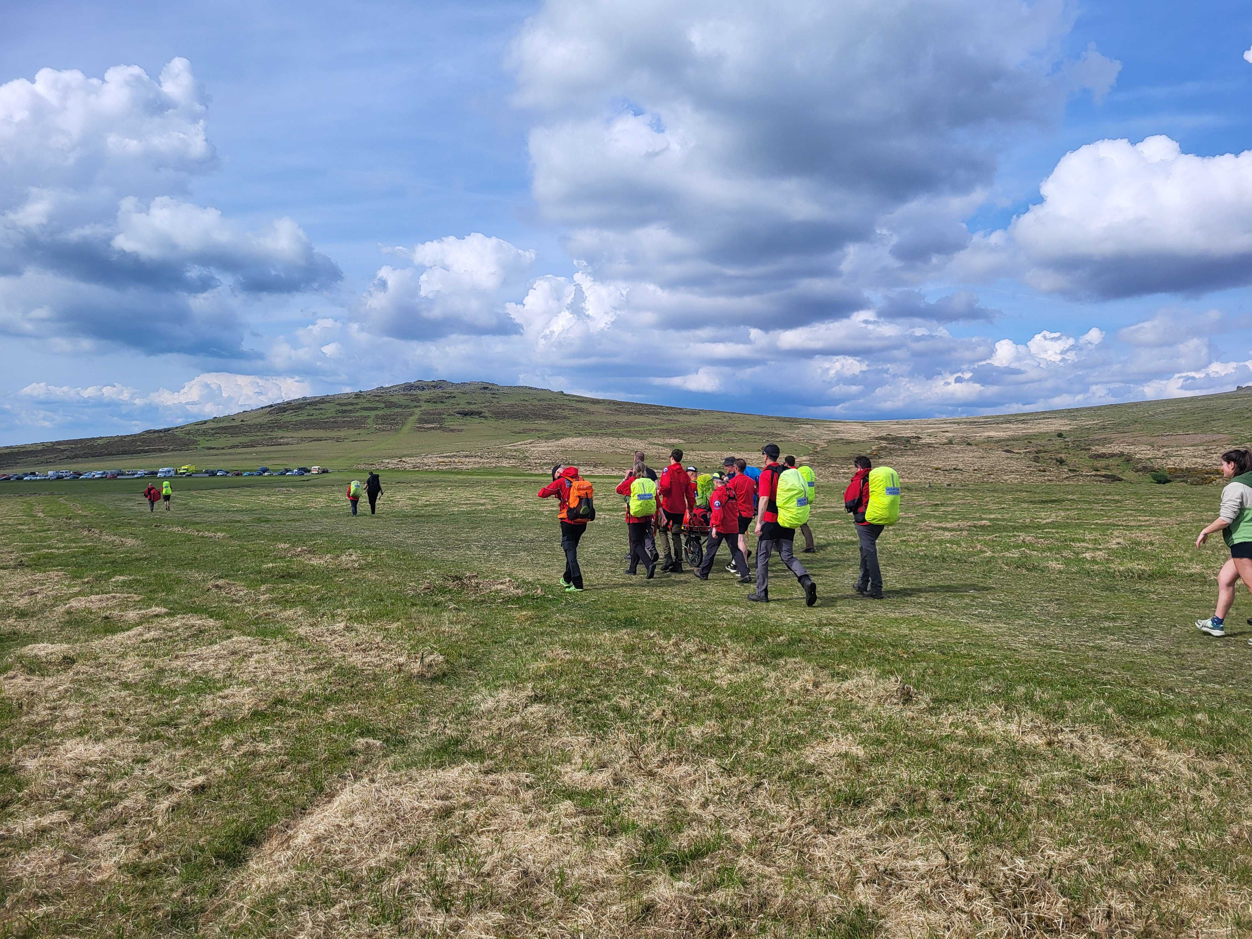The team bringing the casualty to Cox tor carpark to meet the ambulance