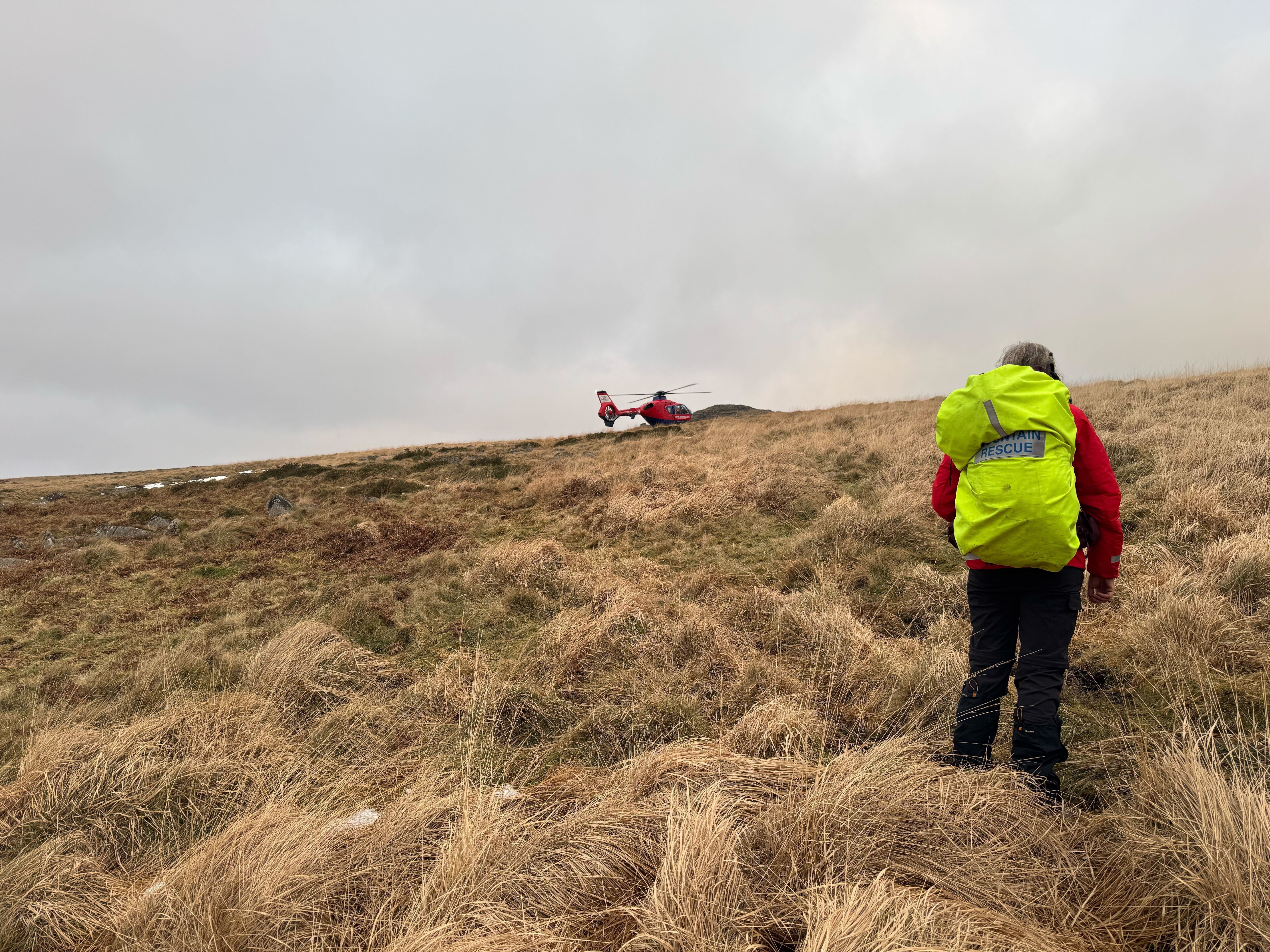 An team member watching the Air Ambulance on a previous call out